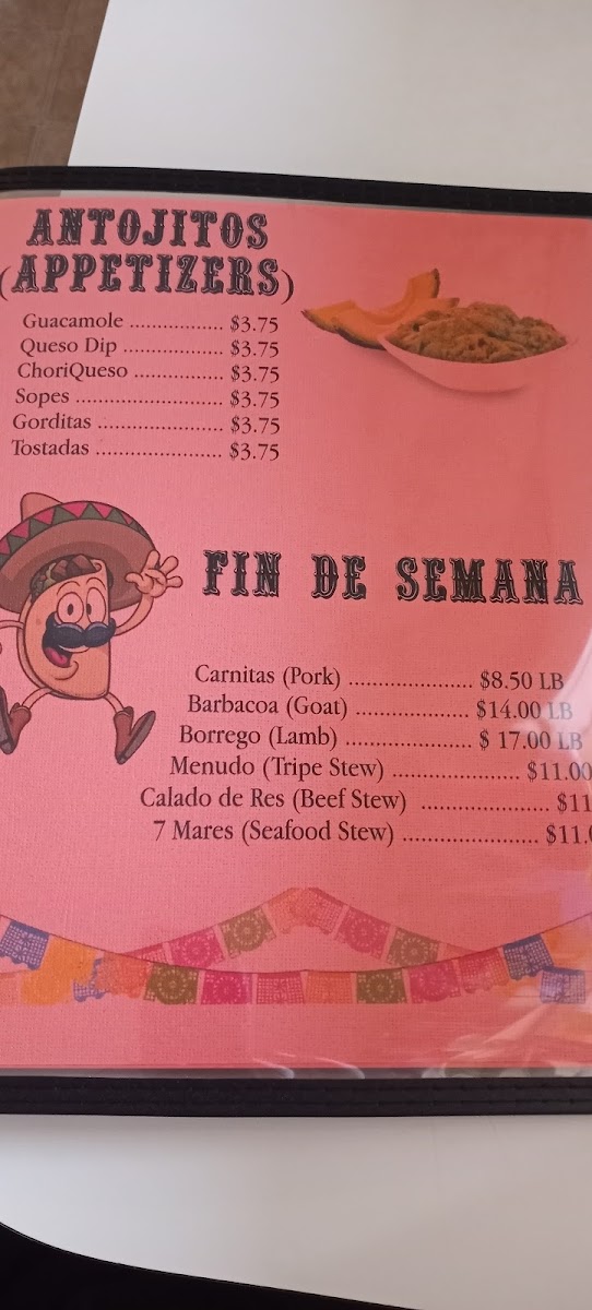 Taquería Milagro menu board