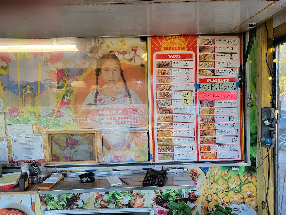 Taqueria la tlayuda menu board