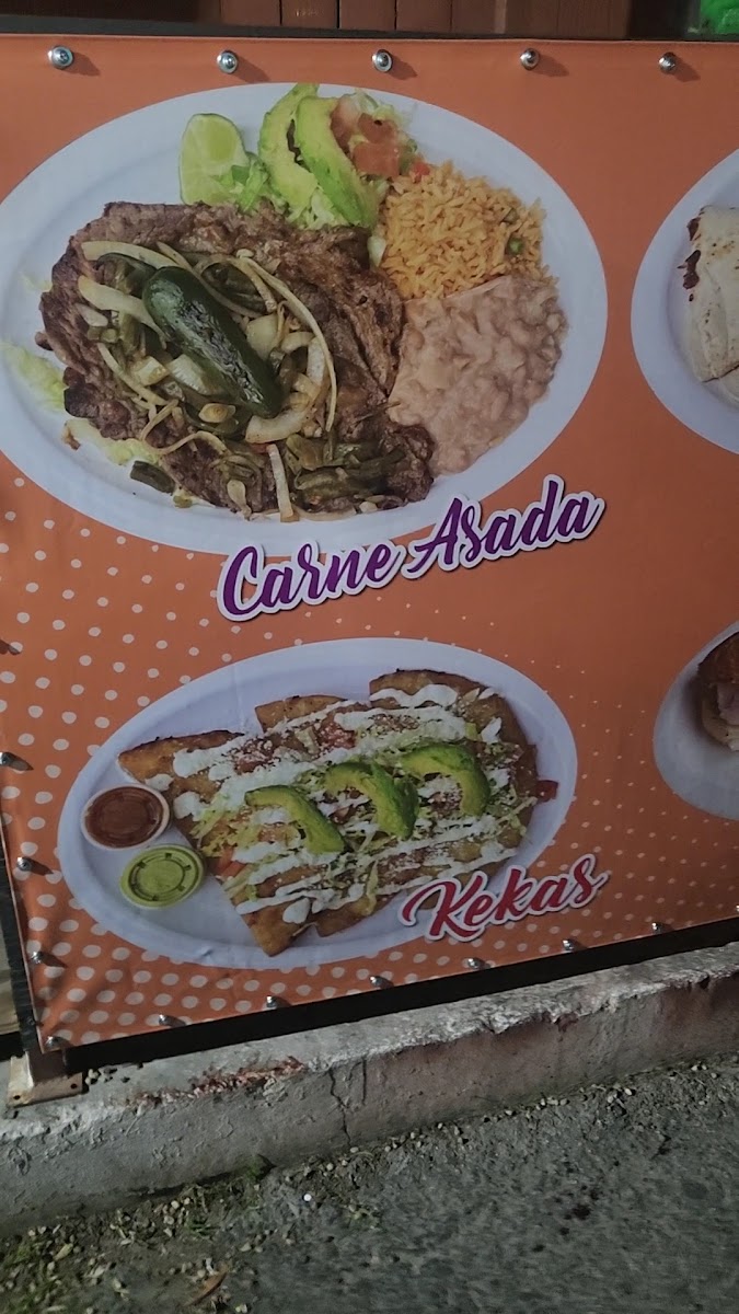 Tacos & Mariscos chelito's menu board