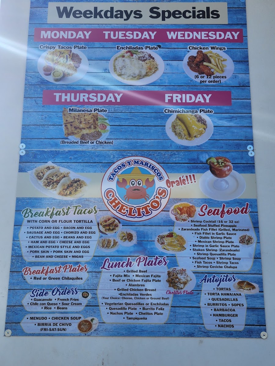 Tacos & Mariscos chelito's menu board