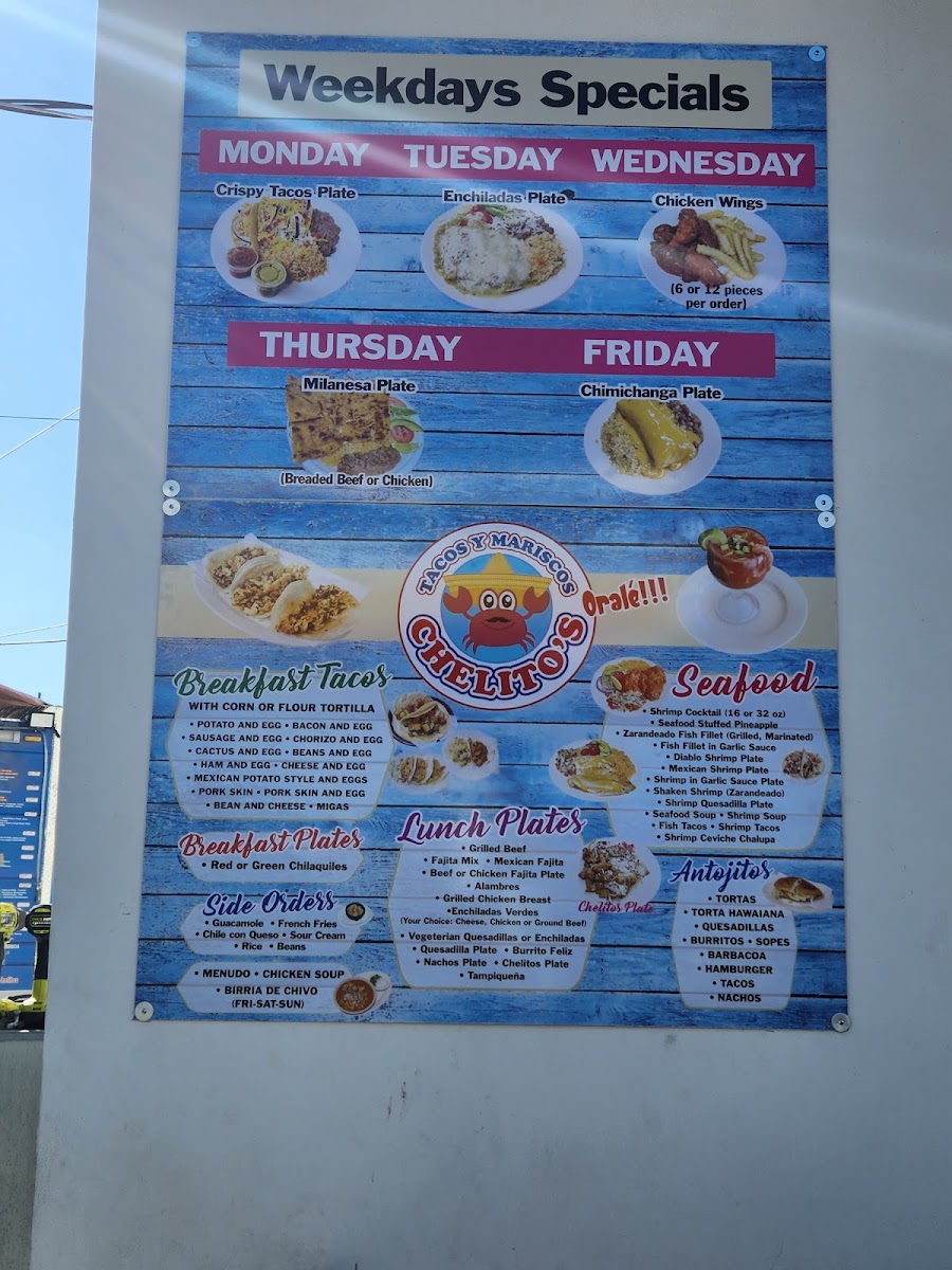 Tacos & Mariscos chelito's menu board