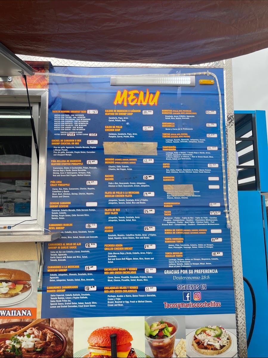 Tacos & Mariscos chelito's menu board