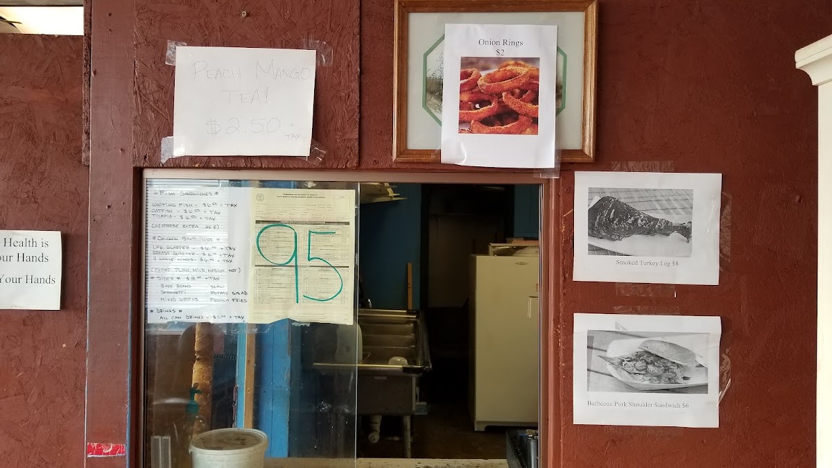 White's Fish, Hot Chicken & BBQ menu board
