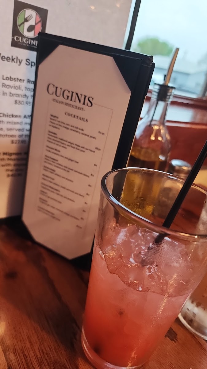 Cuginis Italian Restaurant menu board