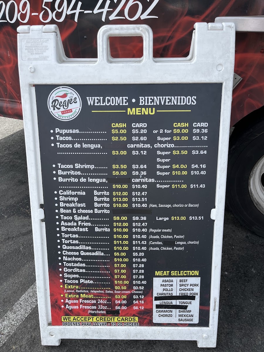 Reyes Taqueria menu board