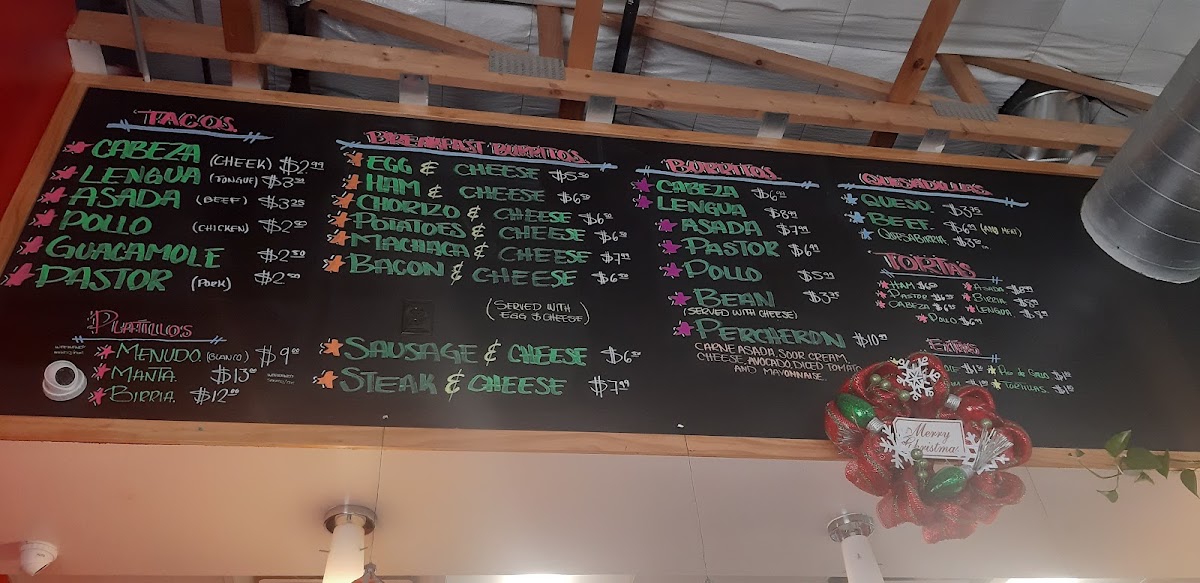 Tacos La Cabeza menu board