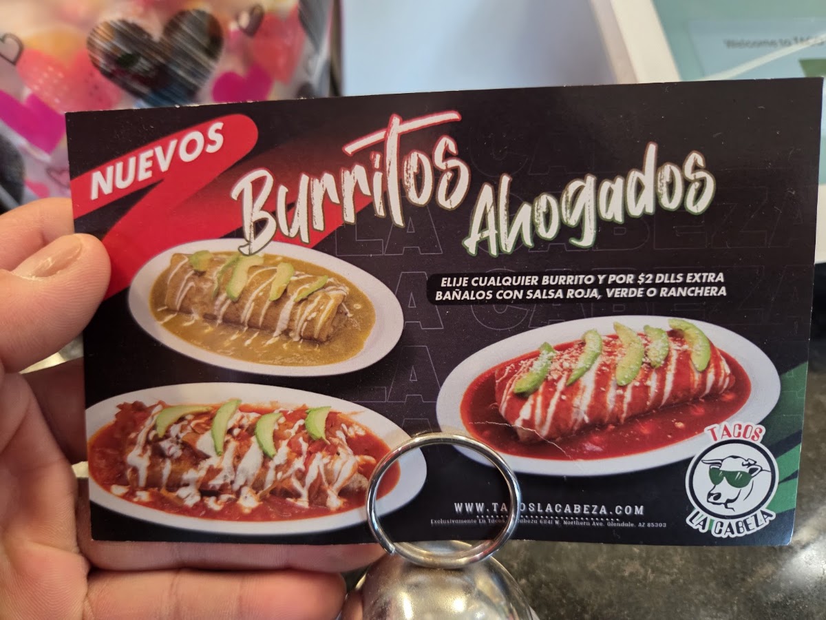 Tacos La Cabeza menu board