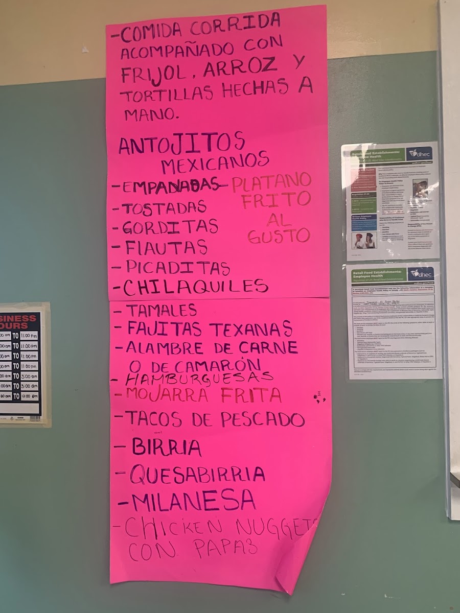 Taquería el Gran Pastor menu board
