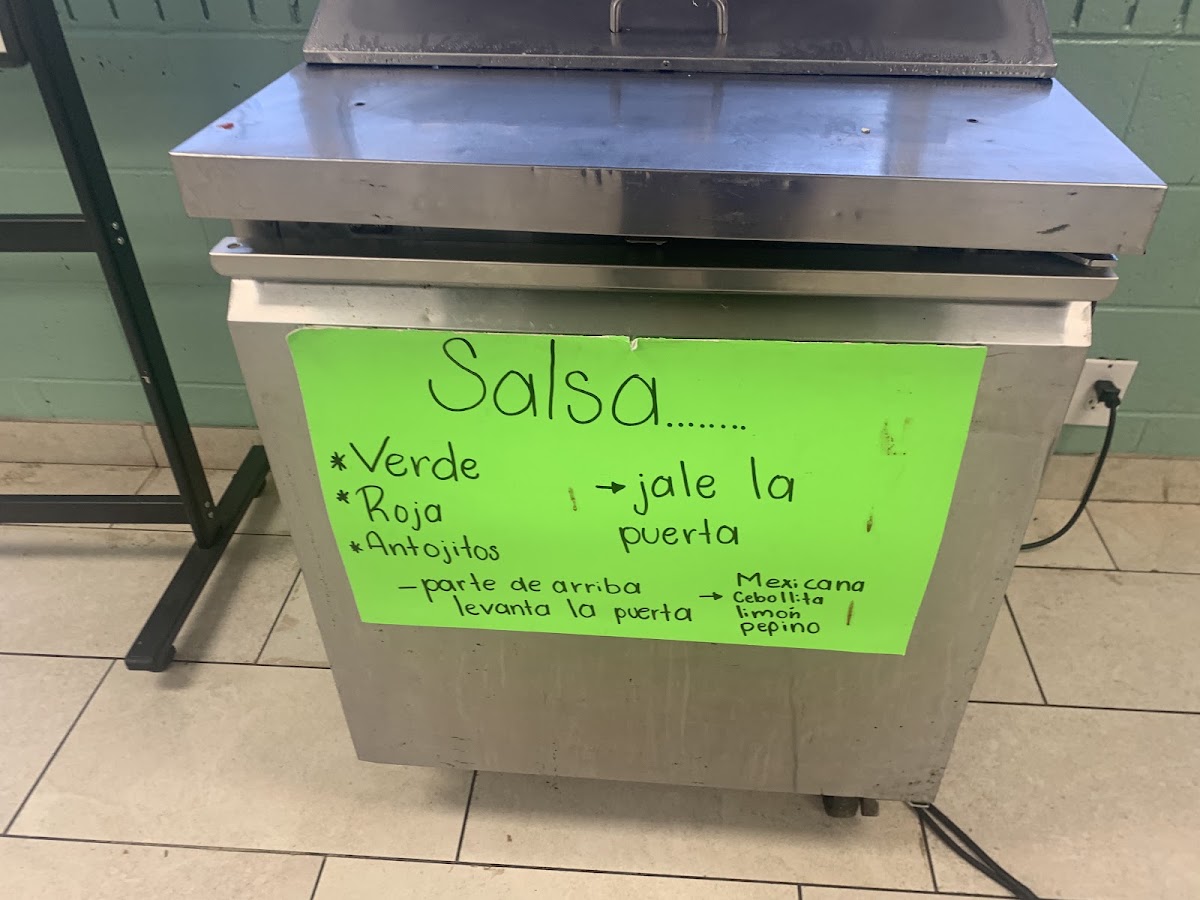 Taquería el Gran Pastor menu board