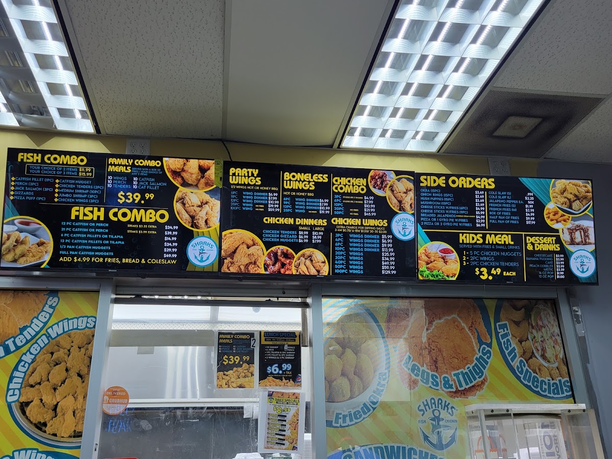Shark's Fish & Chicken menu board