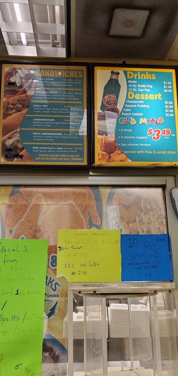Shark's Fish & Chicken menu board