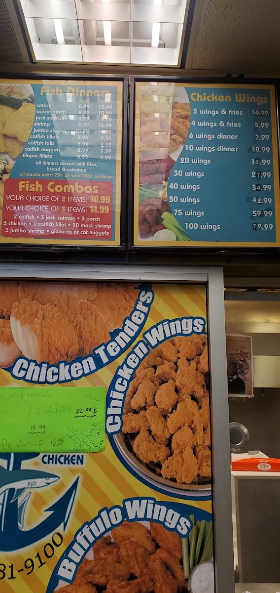 Shark's Fish & Chicken menu board