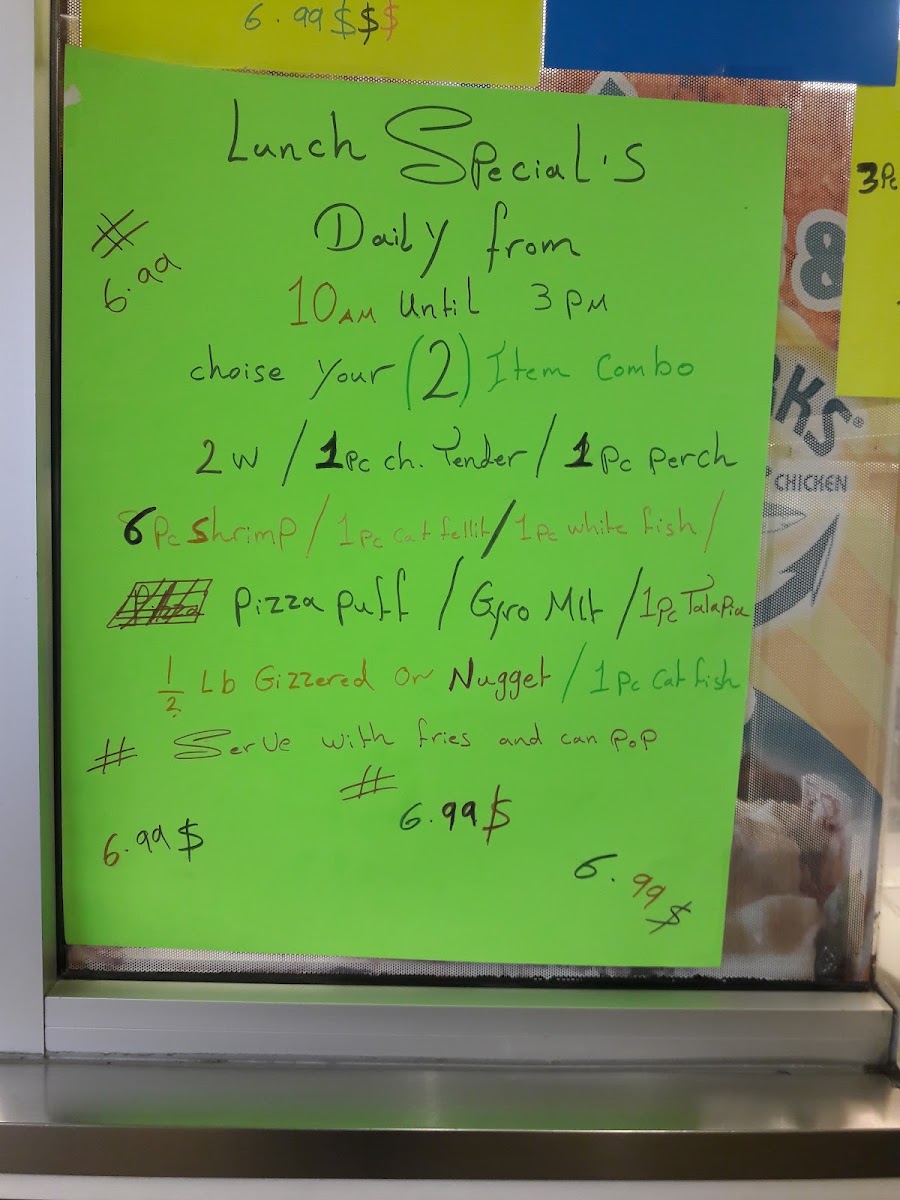 Shark's Fish & Chicken menu board