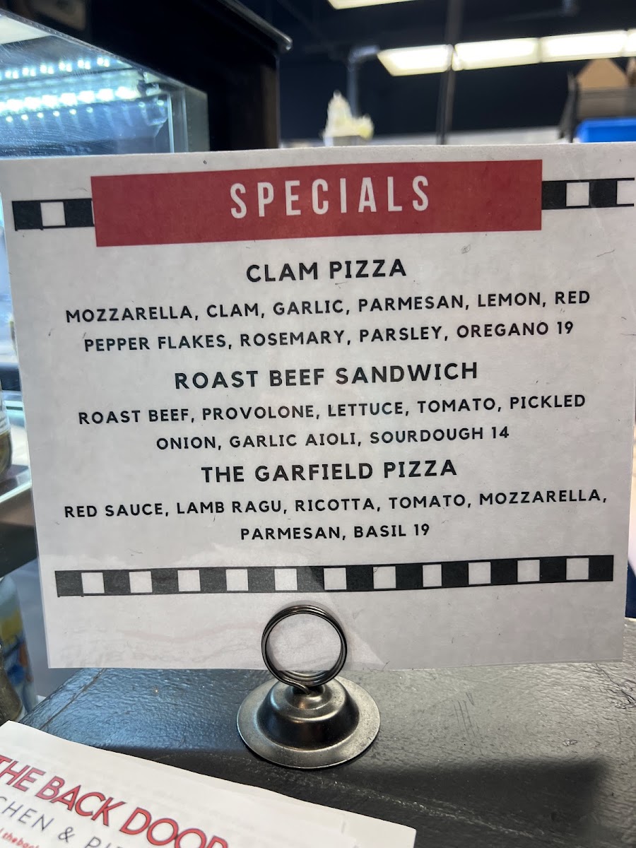The Back Door Kitchen & Pizzeria menu board