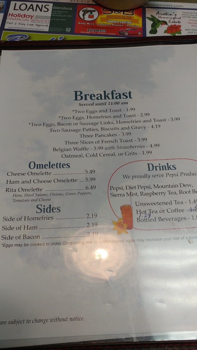 Rita's Bakery & Pizza menu board