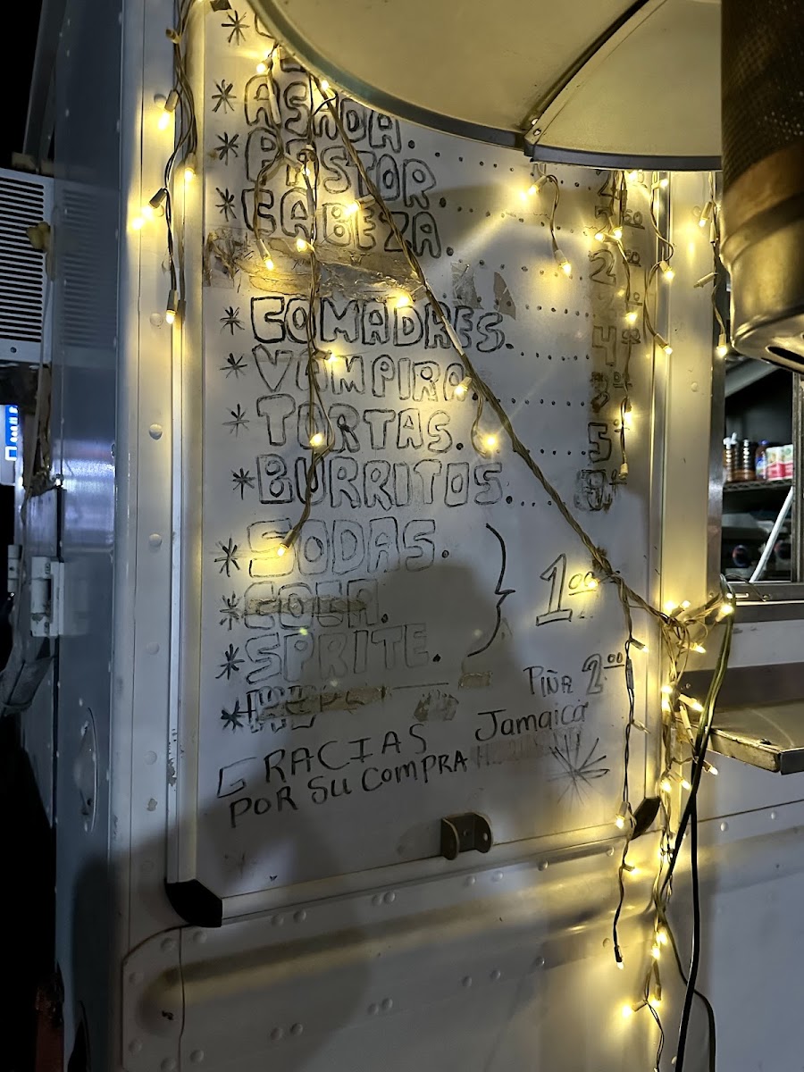 Asadero Los Compadres menu board