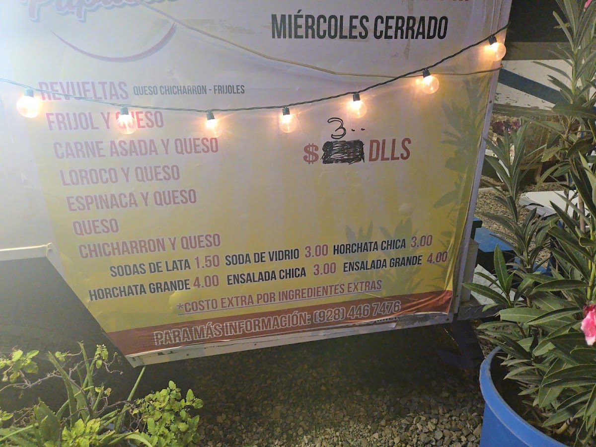Ana's pupusas/Antojitos mexicanos menu board