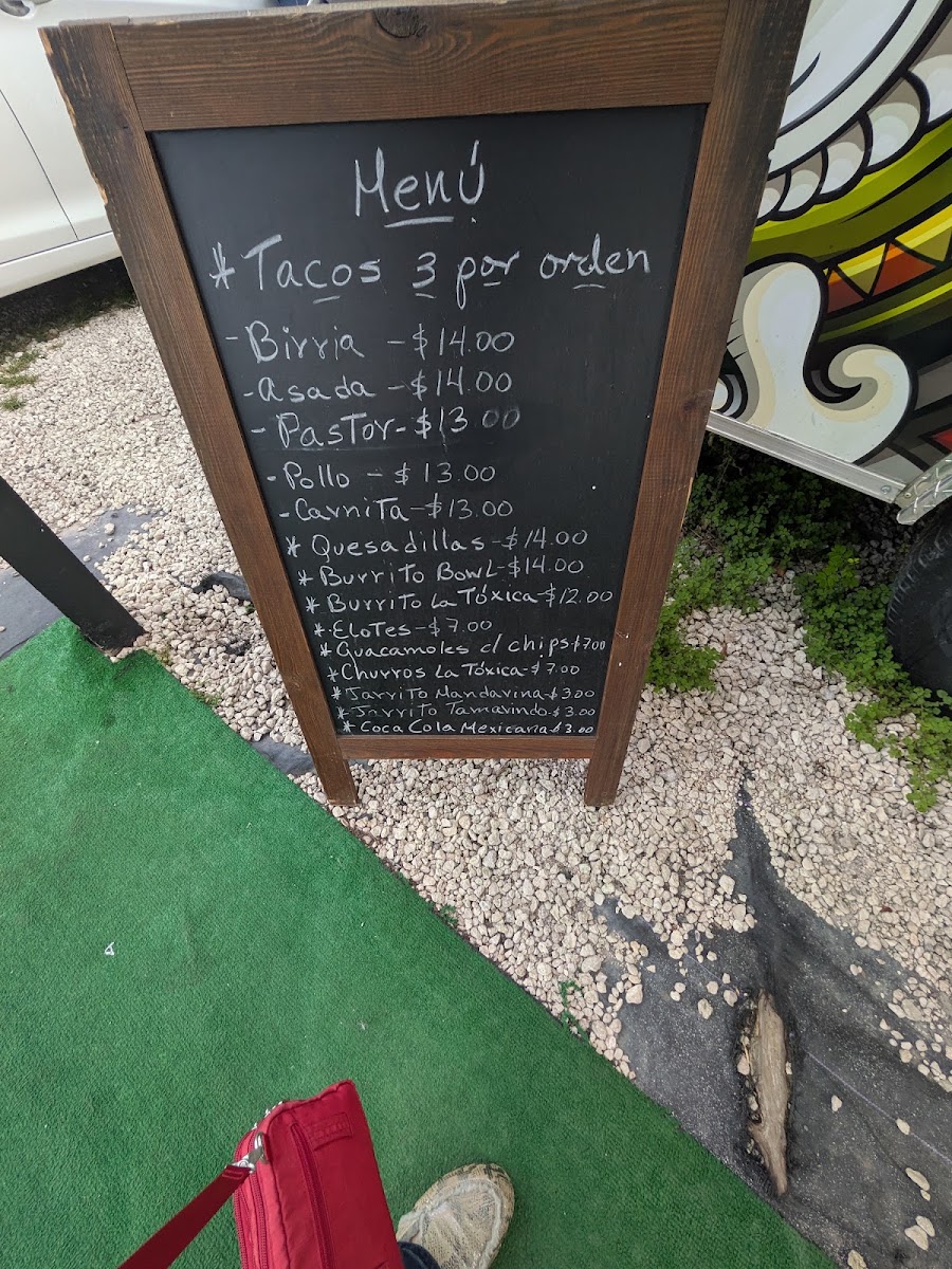 la toxica taqueria menu board