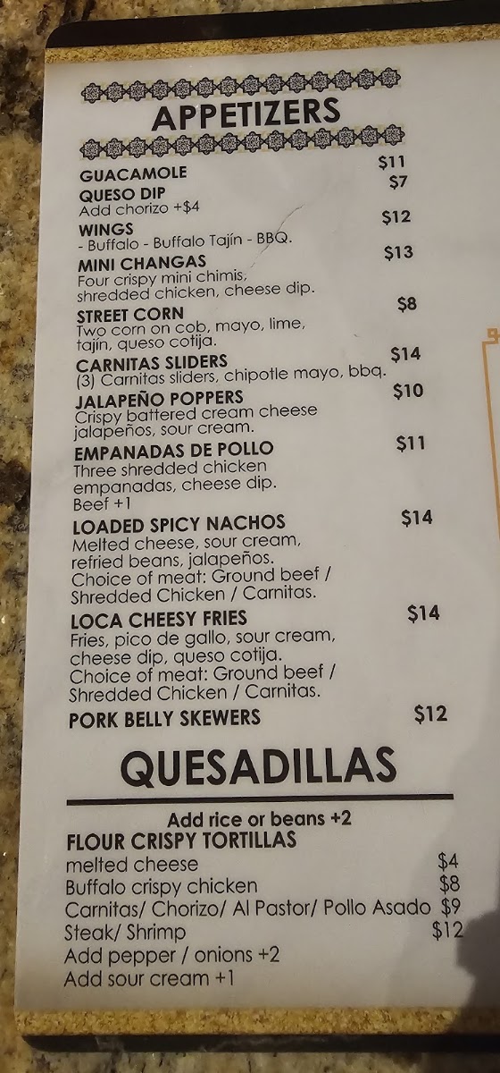 Casa Laura Tacos & Tequila menu board