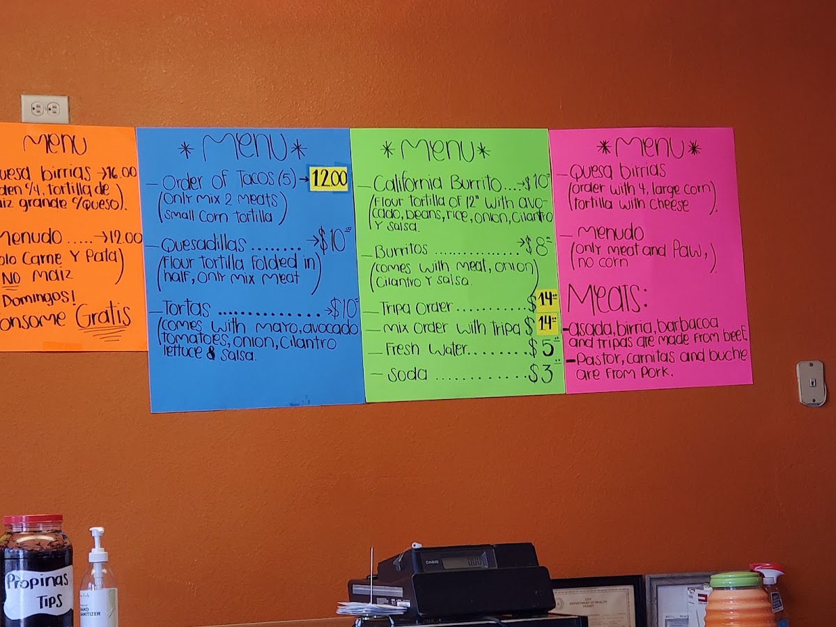 Taqueria Dos Hermanoz menu board