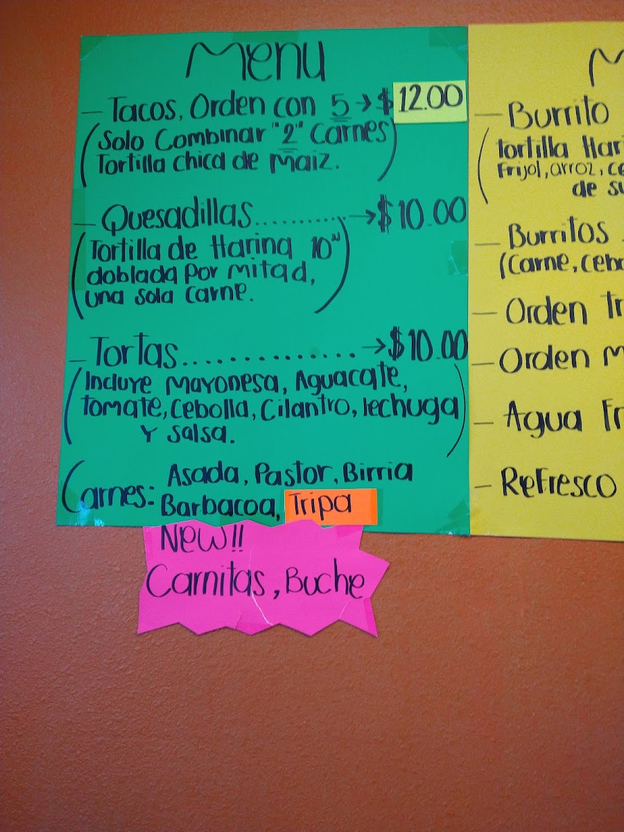 Taqueria Dos Hermanoz menu board