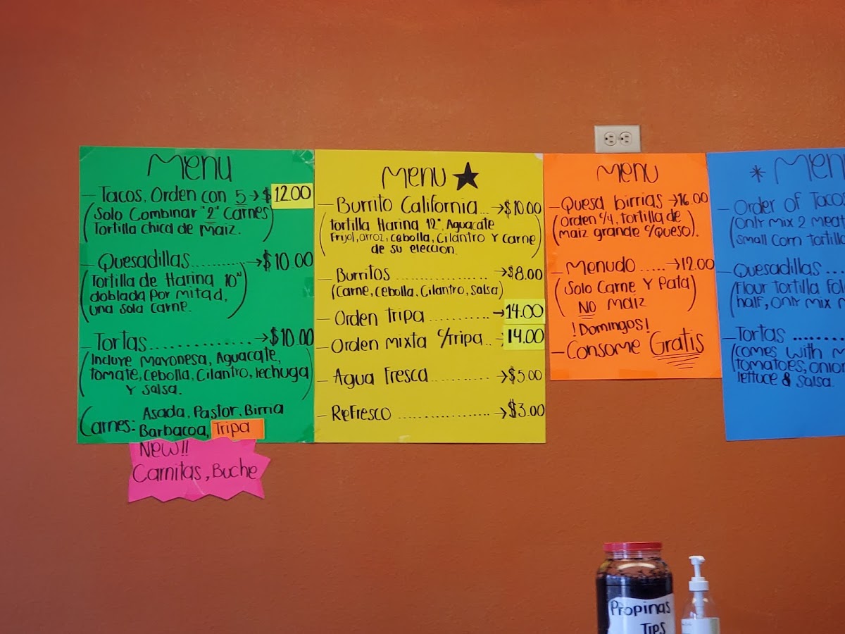 Taqueria Dos Hermanoz menu board