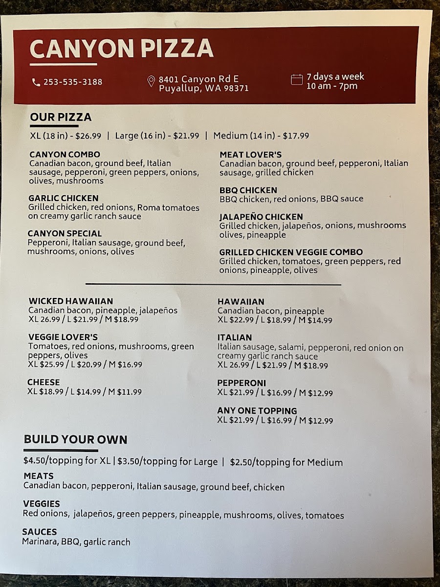 Canyon Pizza and Mini Mart menu board