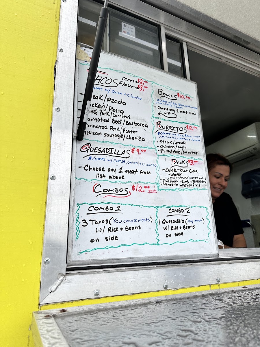 Nin's 5 Tacos menu board