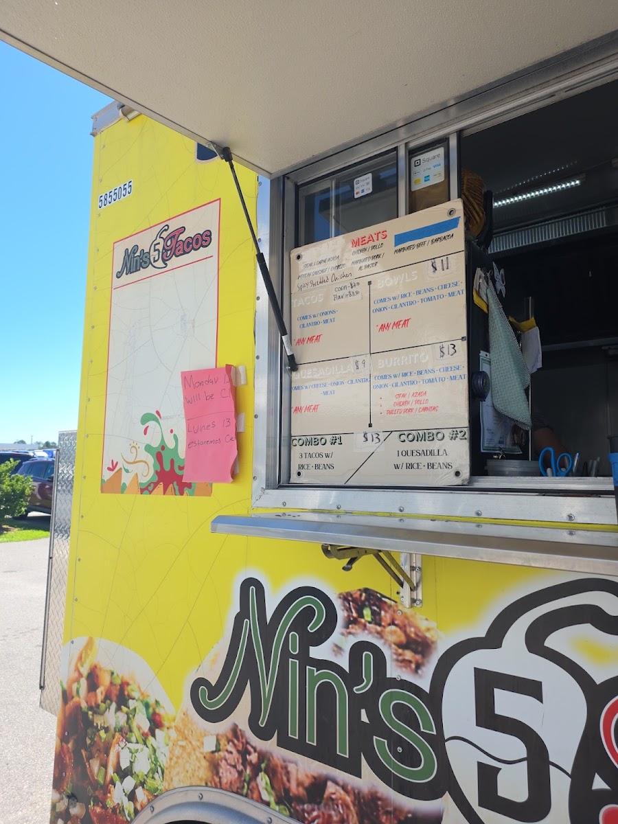 Nin's 5 Tacos menu board