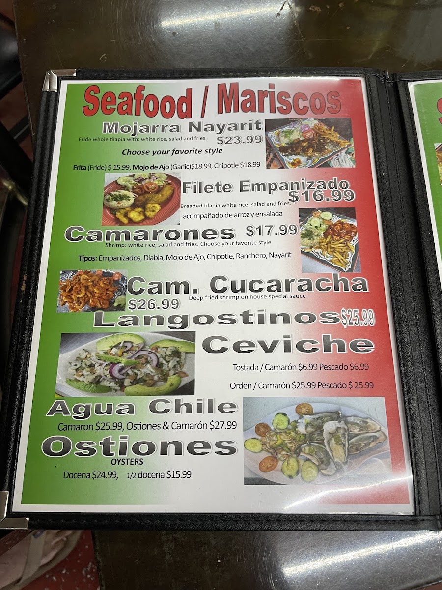 El Tenampa Taqueria & Groceries menu board