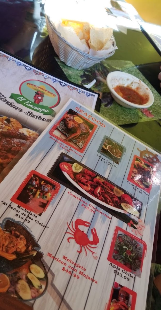 El Tenampa Taqueria & Groceries menu board