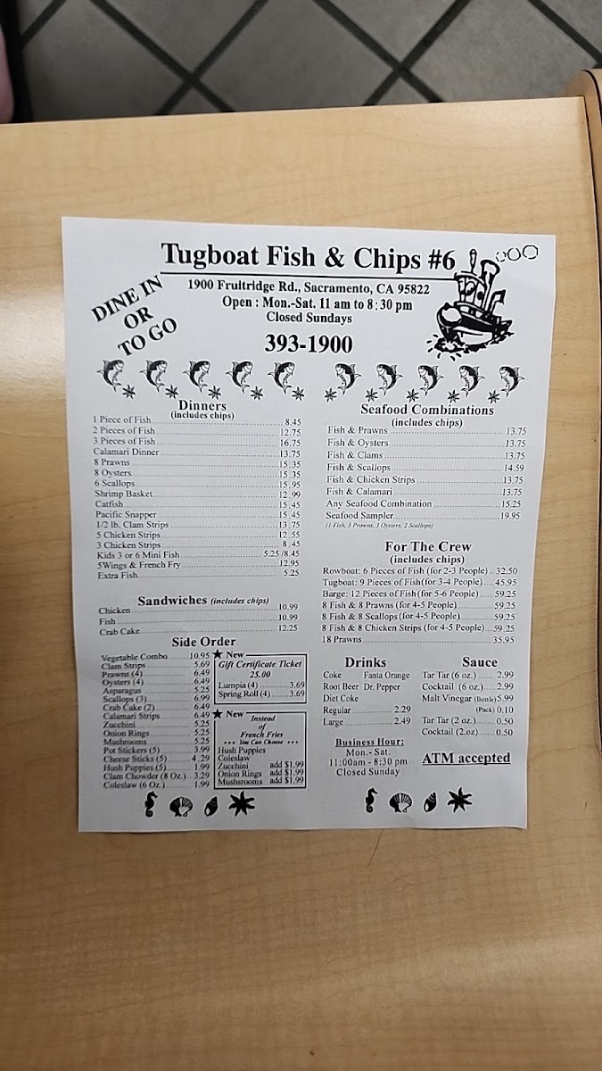 Tugboat Fish & Chips menu board