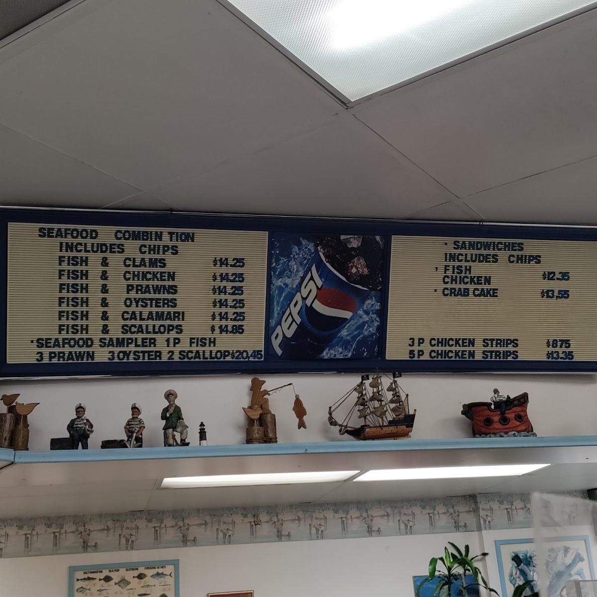 Tugboat Fish & Chips menu board
