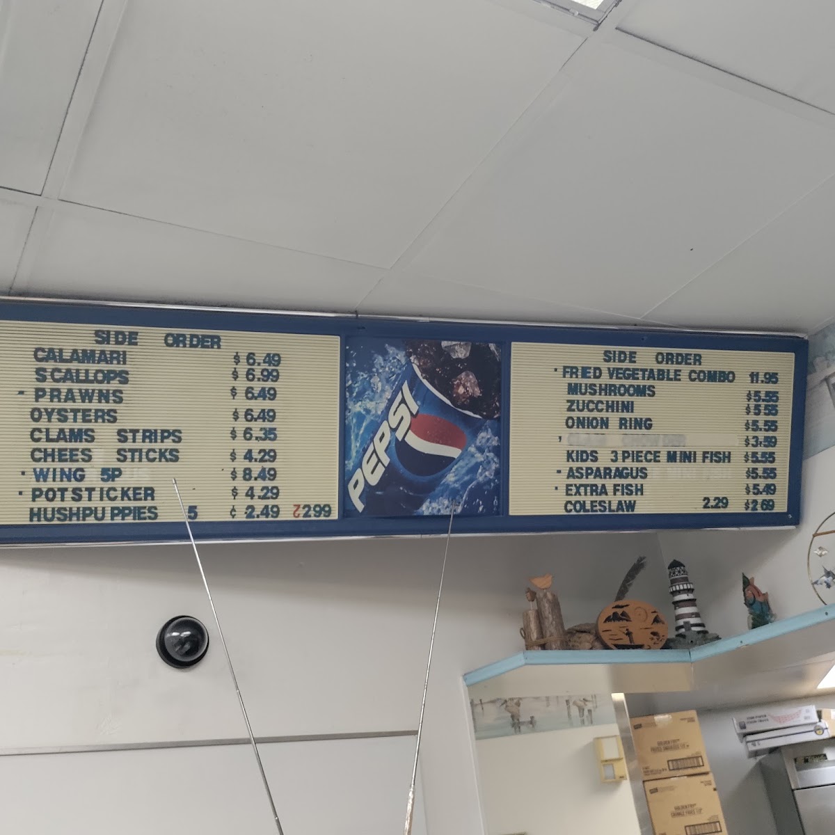 Tugboat Fish & Chips menu board