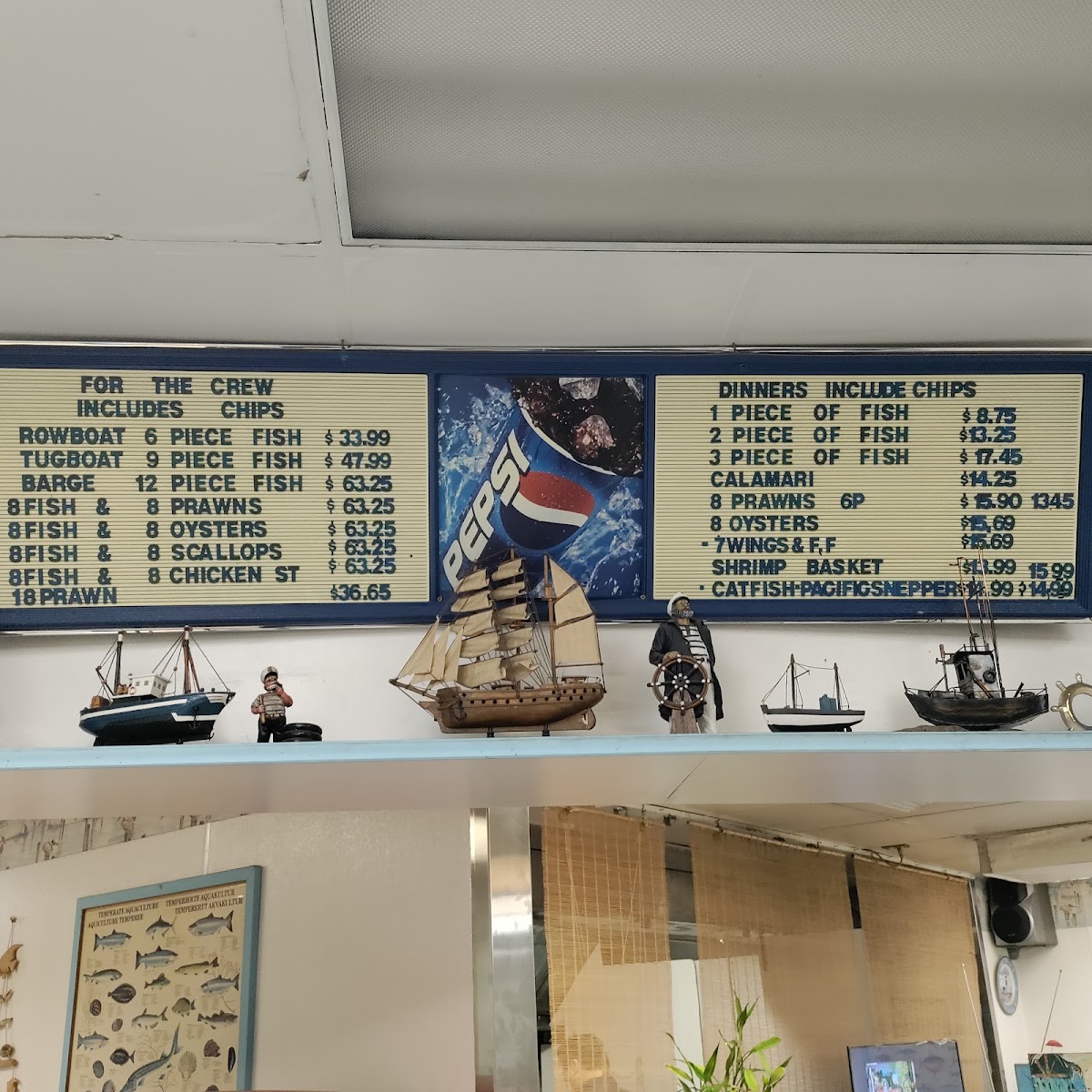 Tugboat Fish & Chips menu board