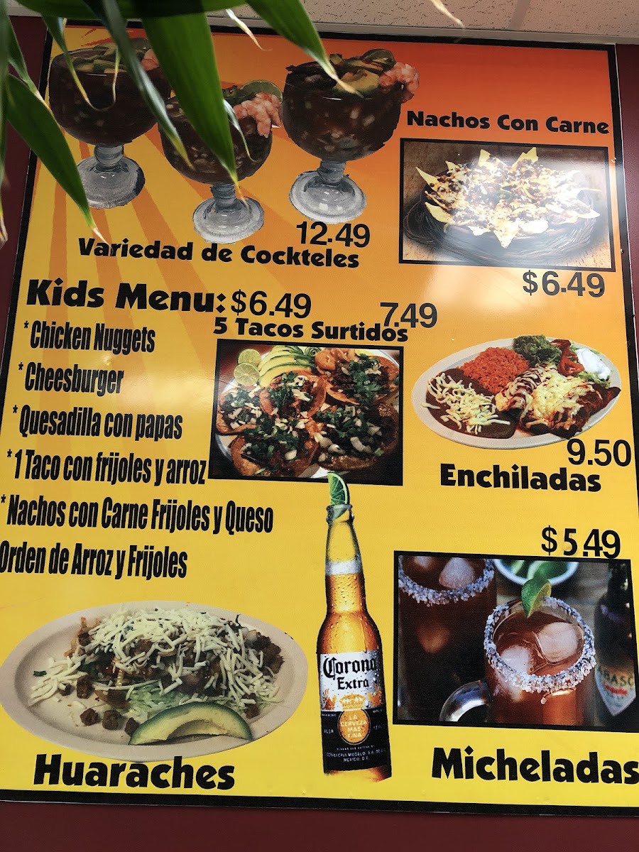 El Canelo Tacos y Mariscos menu board