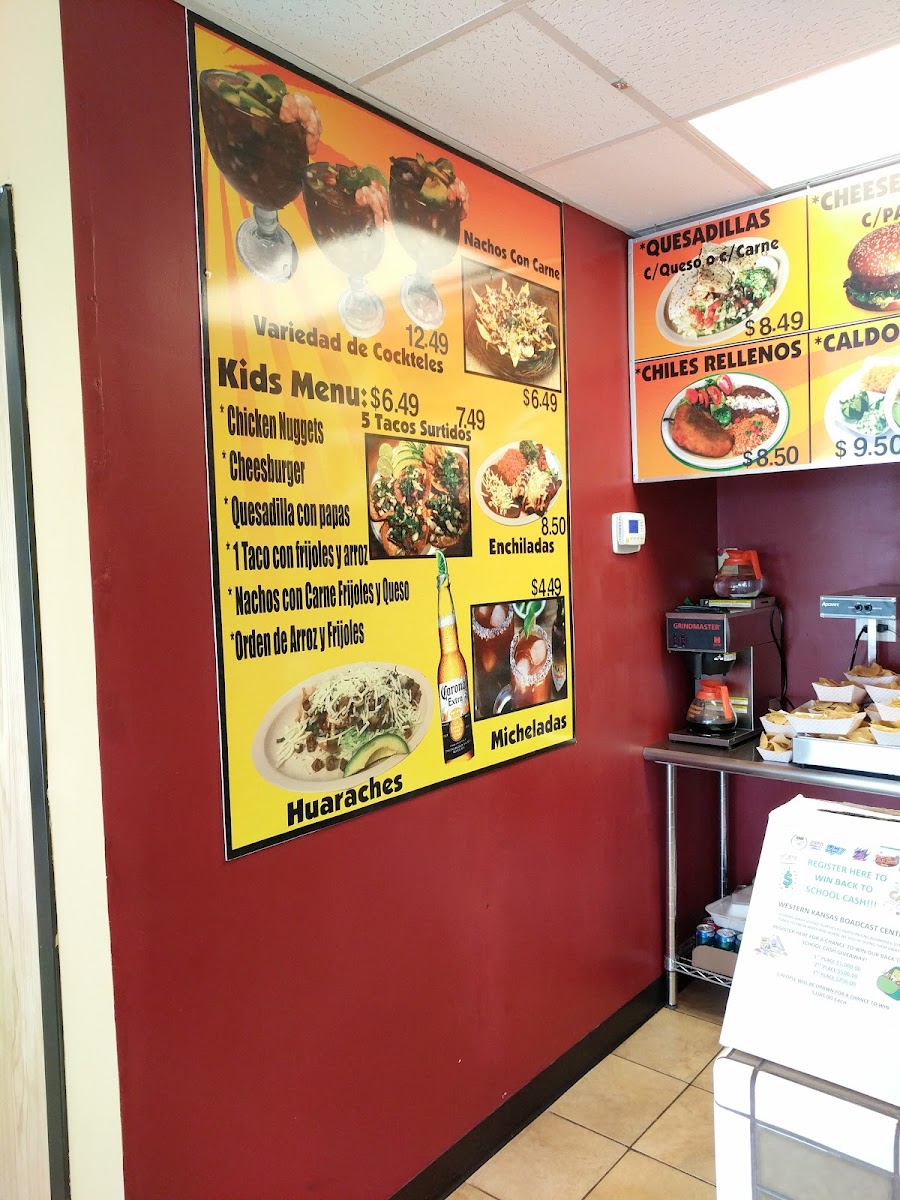 El Canelo Tacos y Mariscos menu board