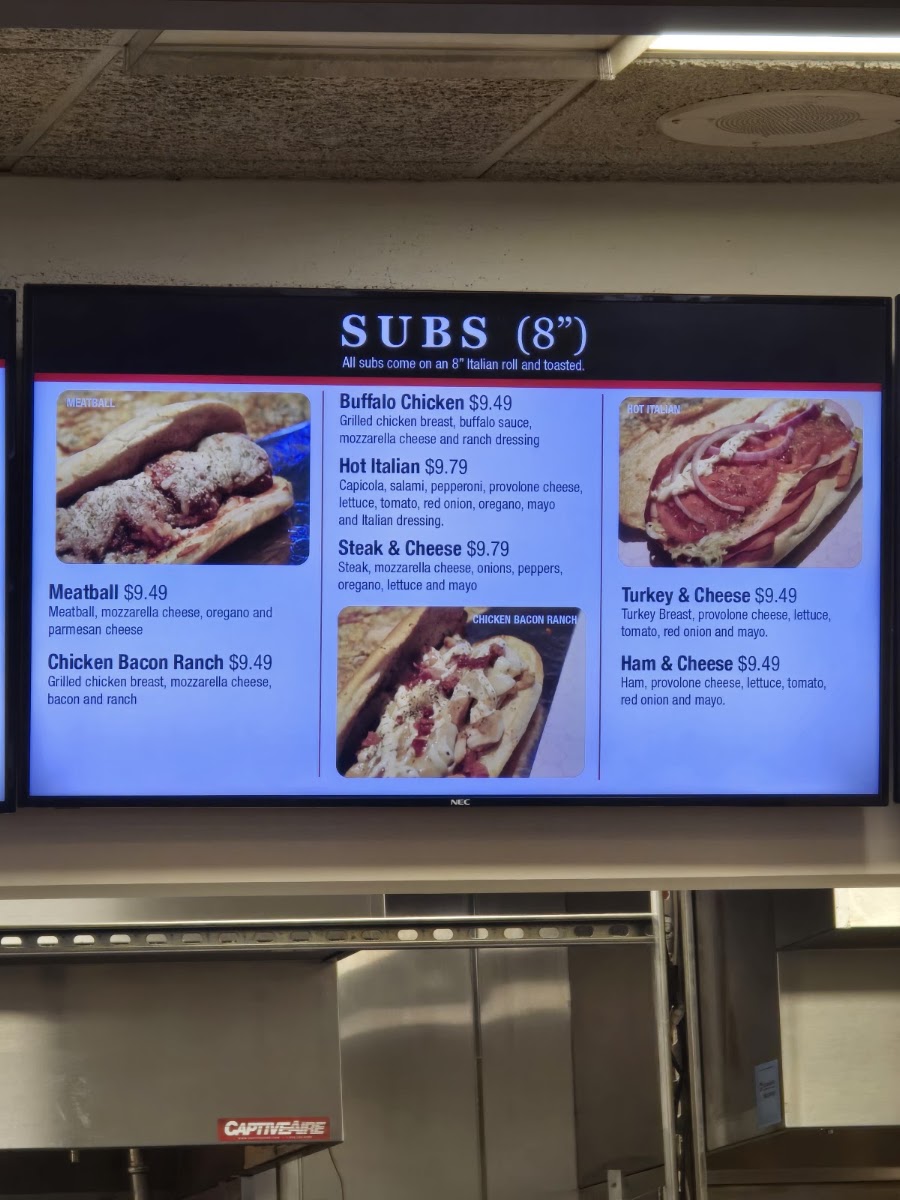 Papi's Pizza and Subs menu board