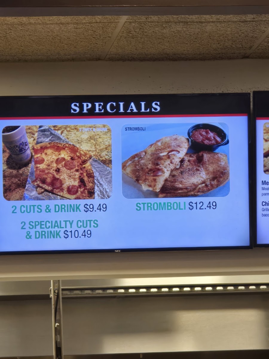 Papi's Pizza and Subs menu board