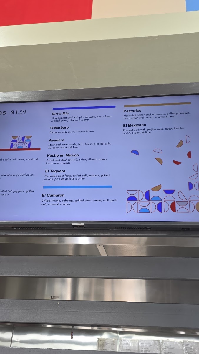 Que Rico Tacos y Mas menu board