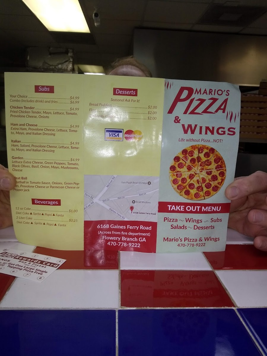 Mario's Pizza, Wings & Catering menu board