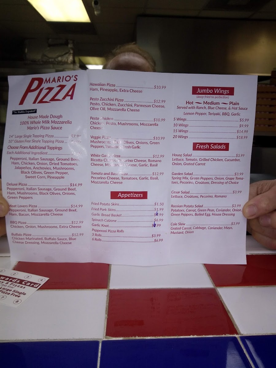 Mario's Pizza, Wings & Catering menu board