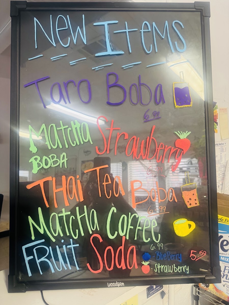 George West Lucky Seafood menu board