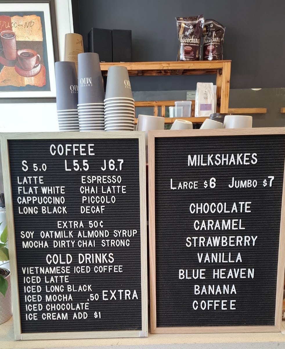 Michelle's Rolls & Coffee menu board