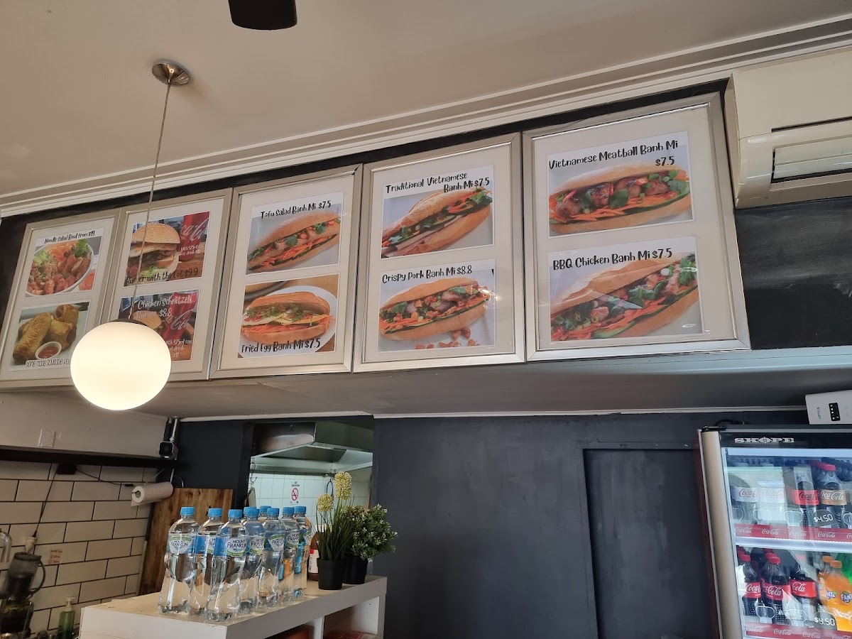 Michelle's Rolls & Coffee menu board