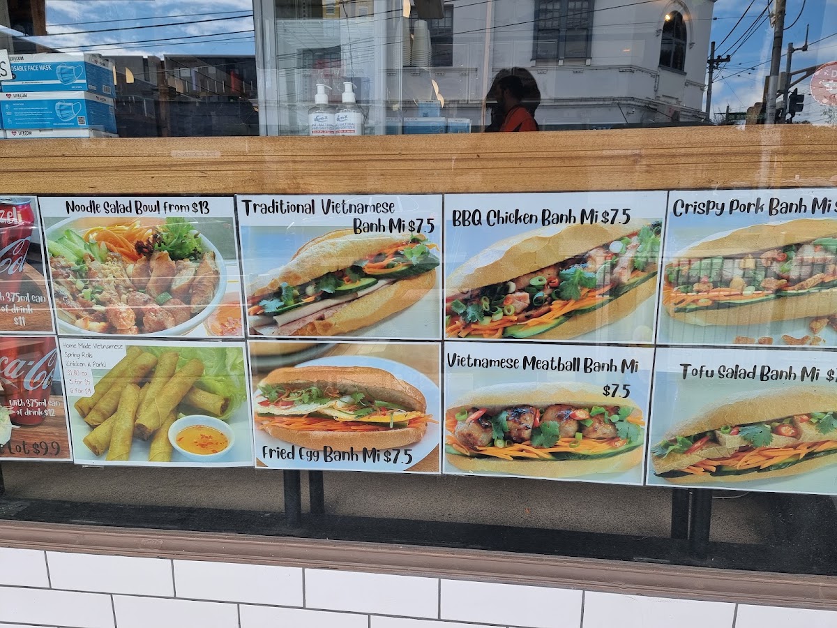 Michelle's Rolls & Coffee menu board