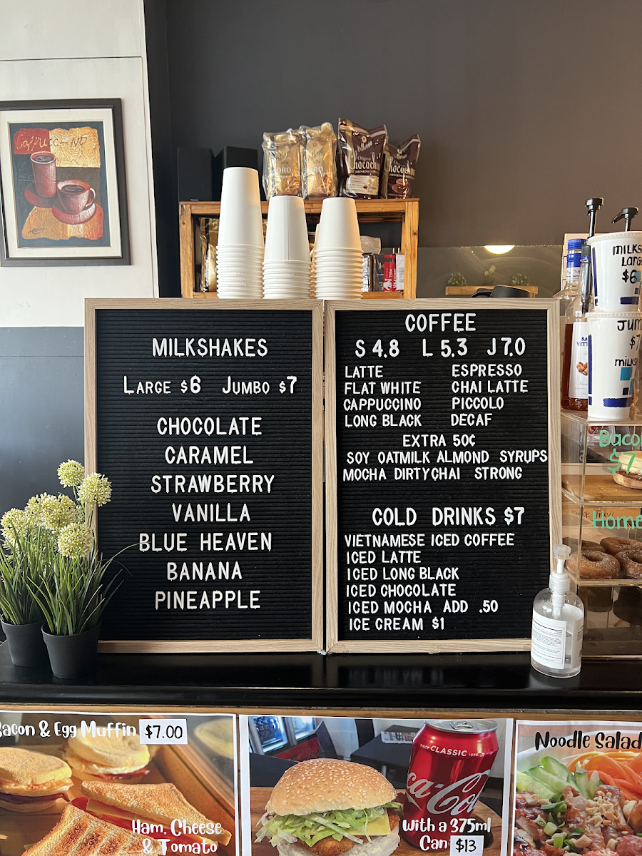 Michelle's Rolls & Coffee menu board
