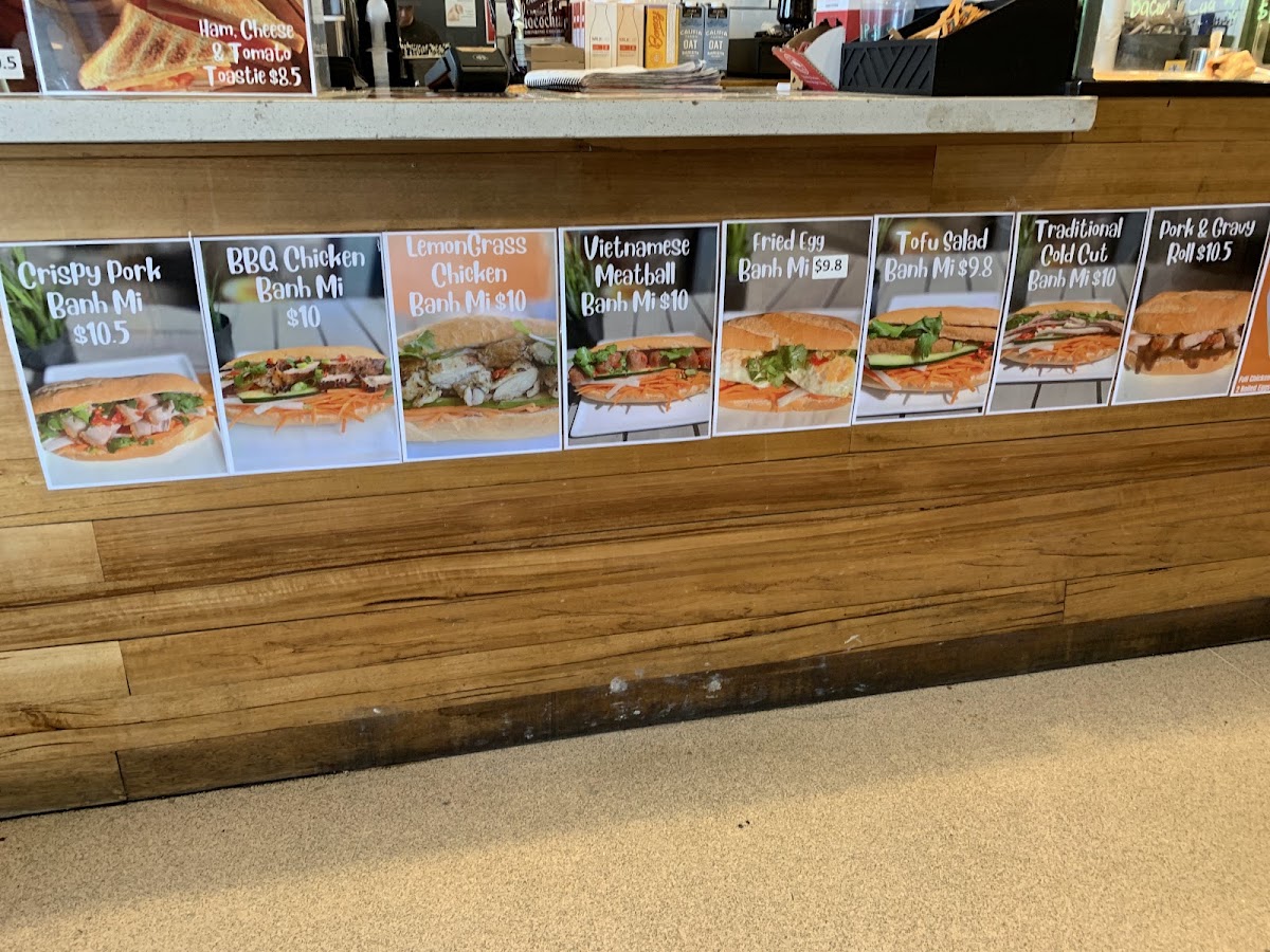 Michelle's Rolls & Coffee menu board