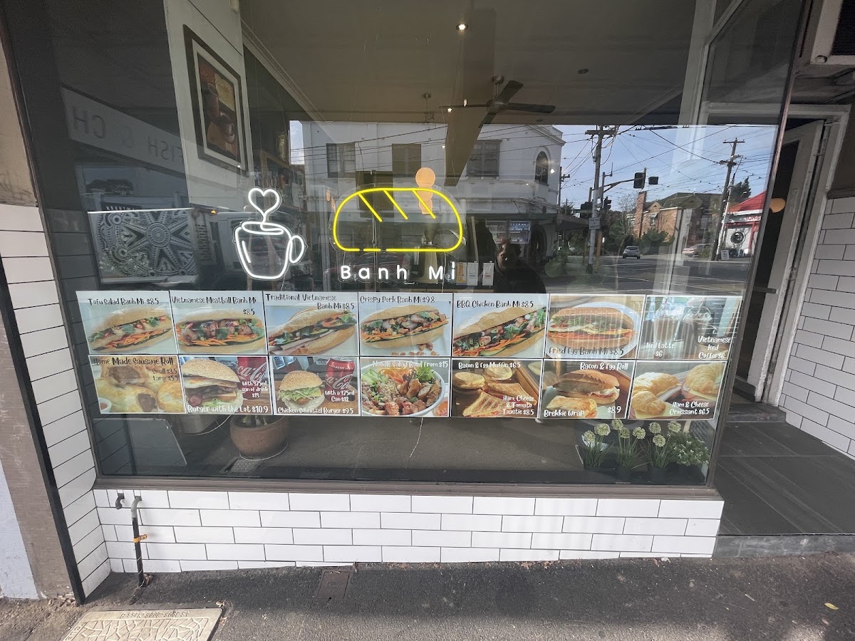 Michelle's Rolls & Coffee menu board
