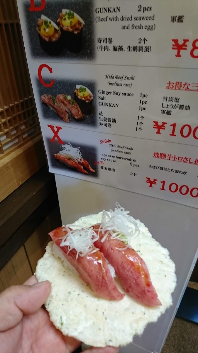 Hida Gyuman Honpo menu board